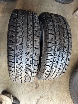 Set of 2 nice tires 235/75/15 ( We install & balance)