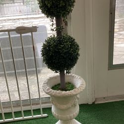 Beautiful topiary tree and planter urn 