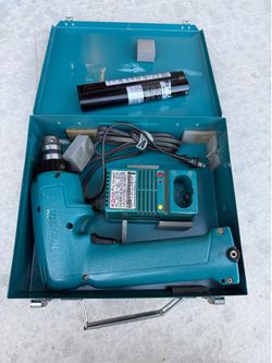 Makita drill with metal case