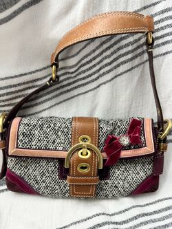 Coach limited edition handbag shown in the image was released in 2005.