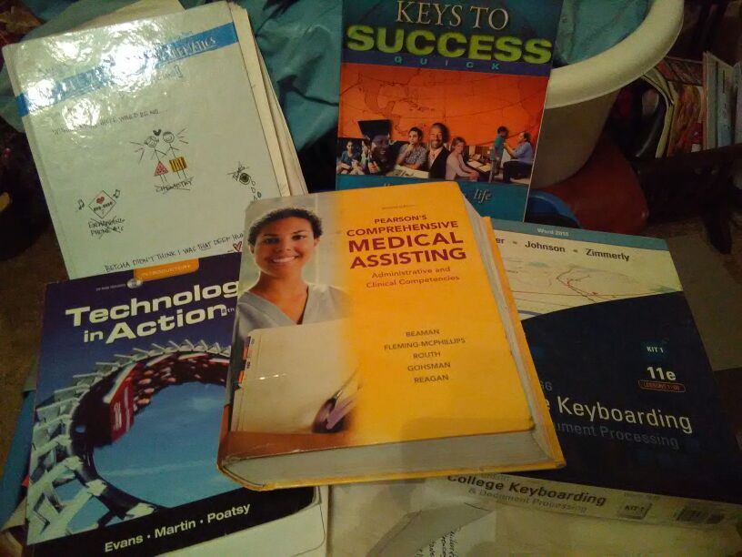 TOTE FULL OF MED ASSISTANT BOOKS