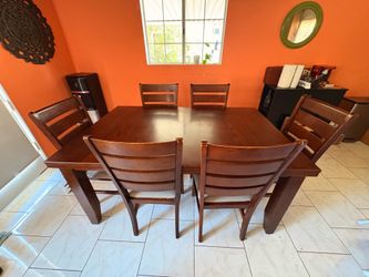 Used dining table with 6 chairs