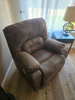 Recliner with Power foot rest and back.