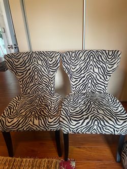 Two chairs zebra print