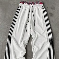 White double wasted sweatpants, striped sides