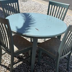 Kitchen Table with 4 cushioned chairs