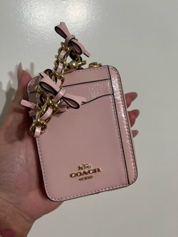 Brand new Coach zip card case soft pink with bows