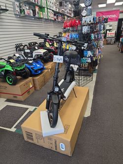 Electric scooter with seat and storage basket cash offer or finance