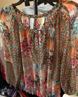 Long sleeve shirt with slit
