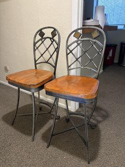 Two Rotating Tall Chairs