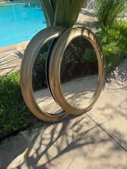 2 Oval Mirrors