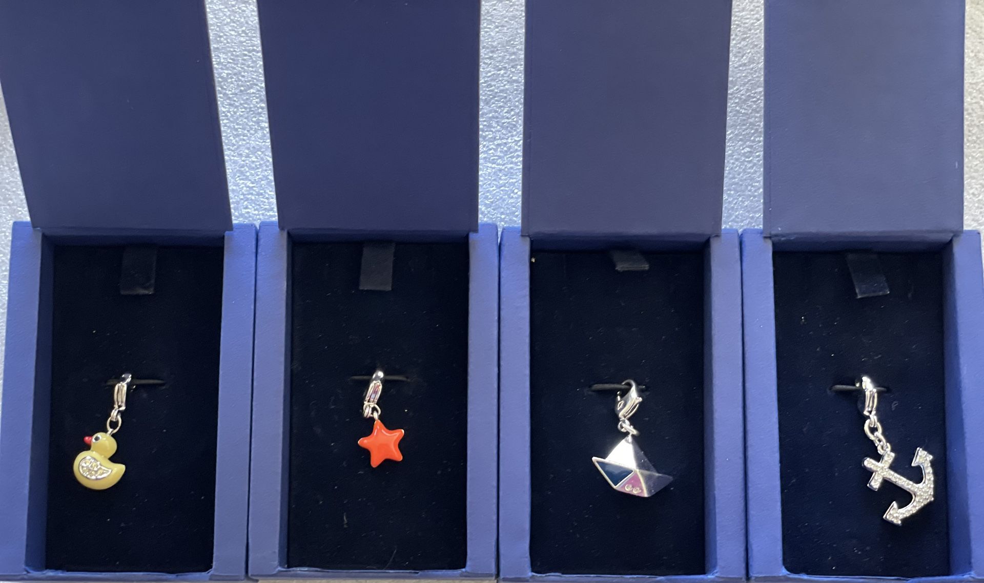 4 Brand New Swarovski love charms
