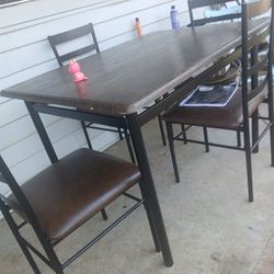 Table Rectangular With 4 Chairs...$40 Dls All