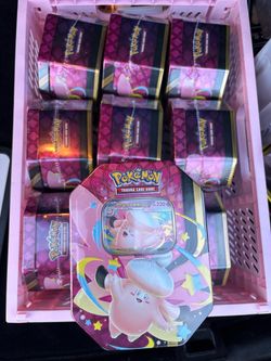 Pokemon Tin with packs