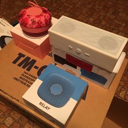 assorted bluetooth speakers