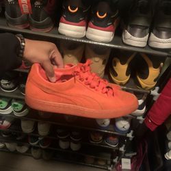 ORANGE PUMAS SIZE 8 MENS