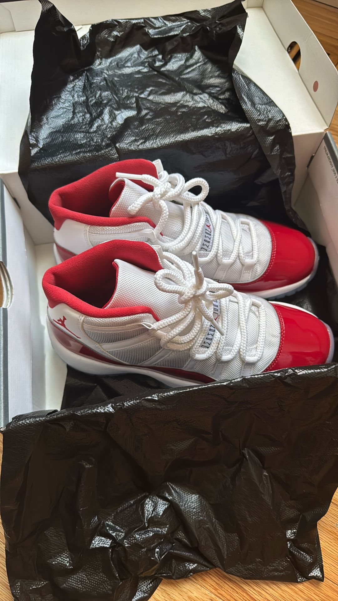 Cherry Jordan 11s . BRAND NEW