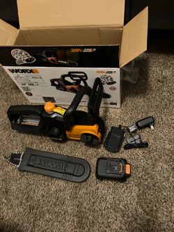 Worx WG322 20V Max Power Share 10” Cordless Chainsaw W/Battery & Charger(See & Click On Pictures). New. Never Been Used
