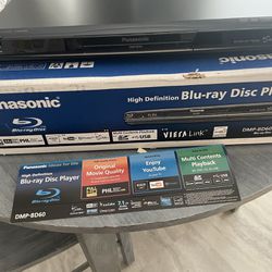 Panasonic DMP Blu-ray disc player with remote.