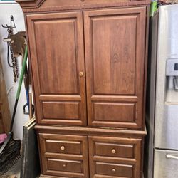 Free must pick up. Real wood armoire 