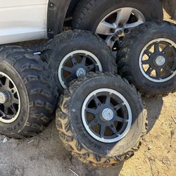 Four Lugs Rims And Brand New Tires