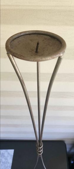 Tall slender candle stand