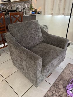 Gray spinning chair