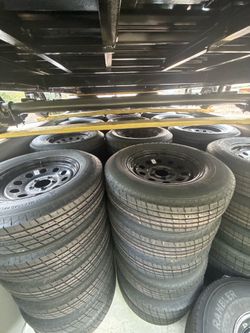Brand new205/75R15 Tire on 5-Lug Rim