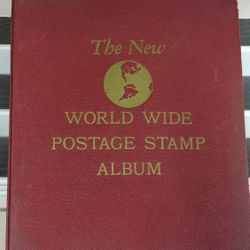 The new worldwide postage stamp album 1958 pre-owned. Vintage