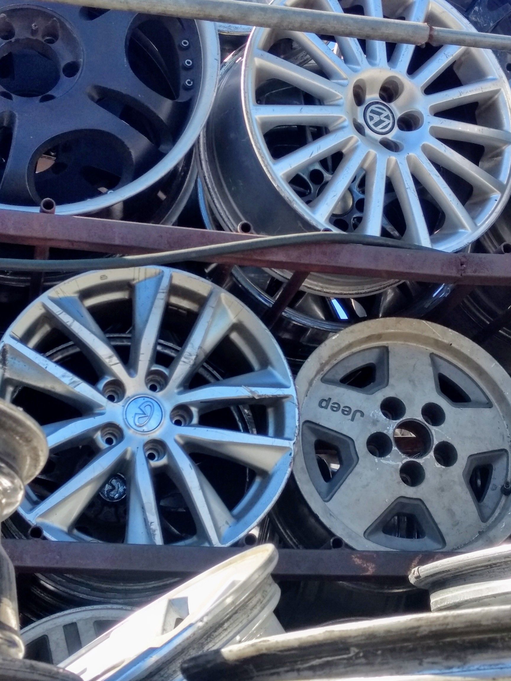 Infiniti Q50, Jeep, and VW Rim