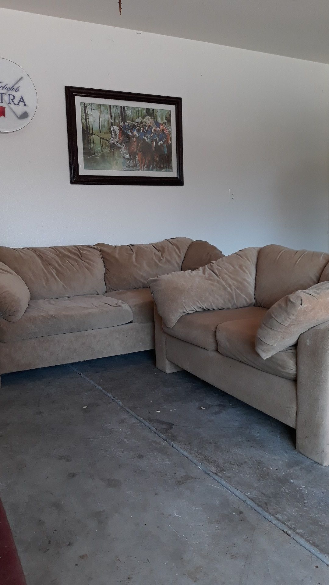 Light brown couch and loveseat