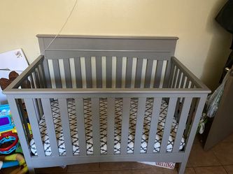 baby crib includes mattress