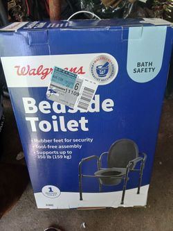 Bed side toilet still in box