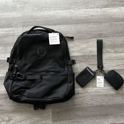 black Lululemon backpack and keychain