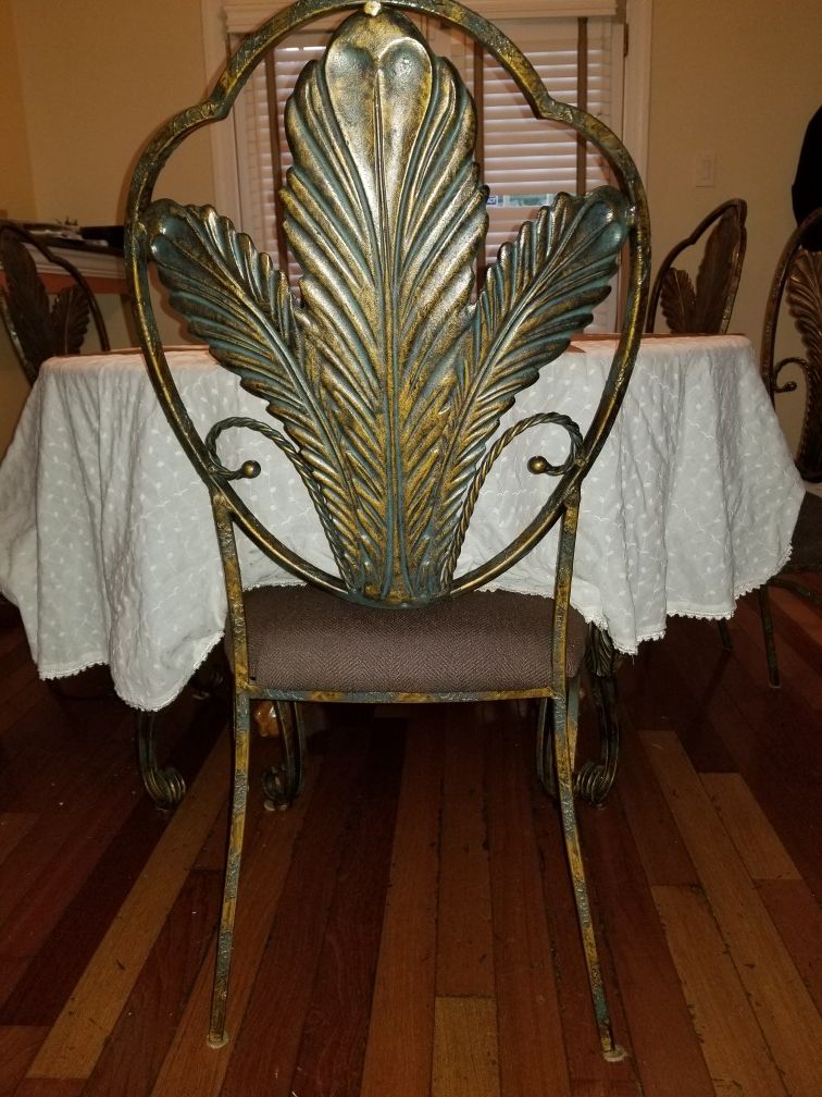 6 cast iron dining room chairs, and dining room table!