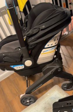 Black Evenfllo Shyft dual ride infant car seat
