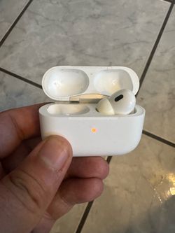 Apple AirPods Pro Gen 2 with Charging Case and right AirPod