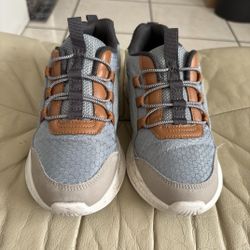 Crimson children's sneakers from Carter's brand.