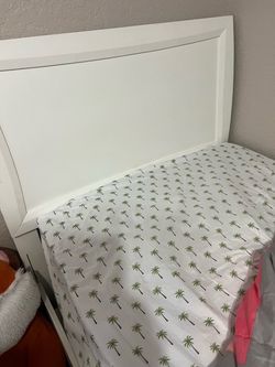 Twin bed frame with mattress and box spring