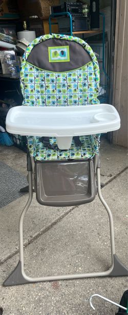 Cosco Simple Fold High Chair featuring an elephant-patterned seat pad.