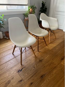 Mid-Century Eames white armchair and dining chairs