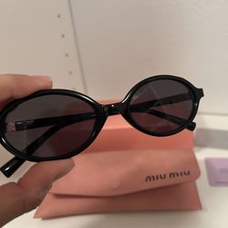 MIU MIU Women's  MU 04ZS