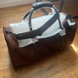 vintage Marlboro "Guts & Grit Gear" duffle travel bag made of brown suede 100% Pure leather. 
