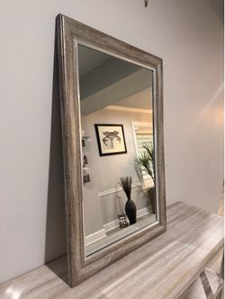 Framed wall mirror
