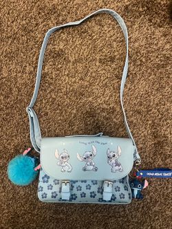 Stitch purse, used once like new $20- includes keychains