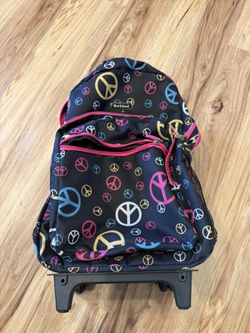 Rockland 17" Rolling Backpack – Peace Sign Pattern (Great Condition)
