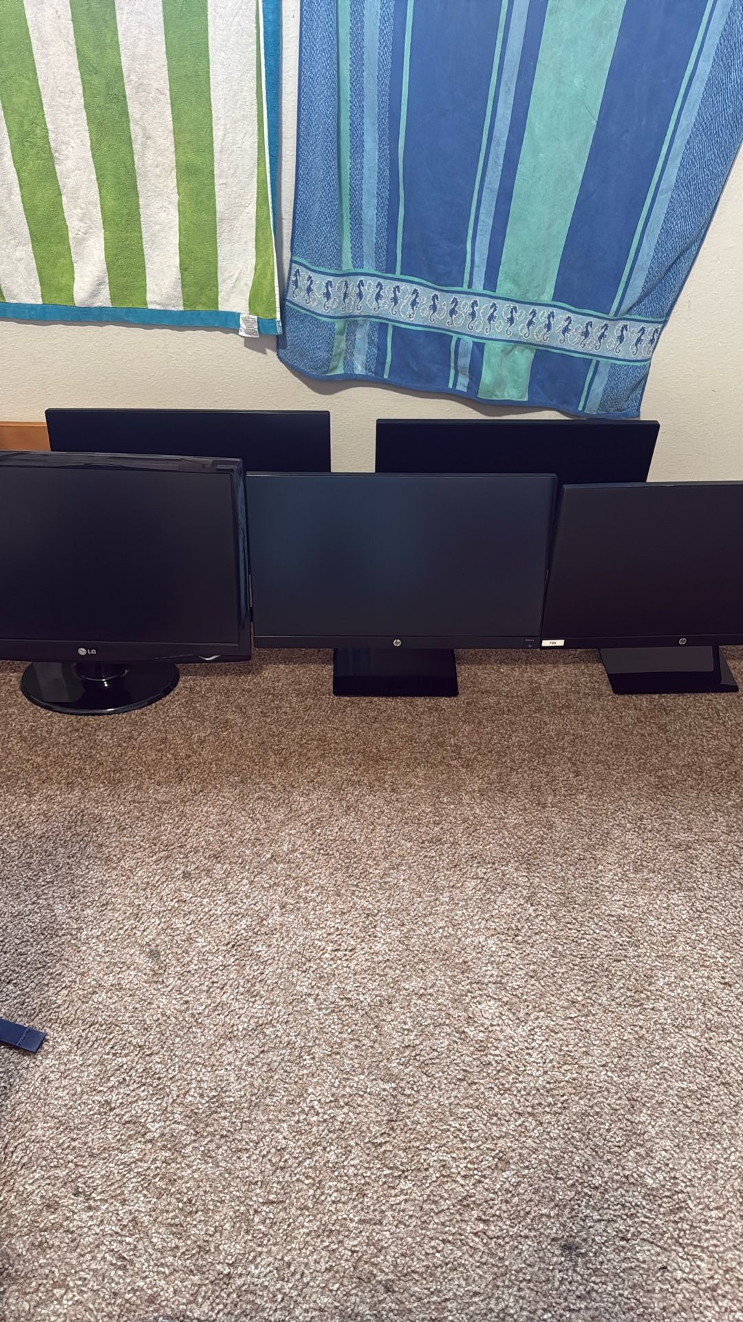 4 HP full HD Monitors/1LG Monitor ($100 Each) (NEGOTIABLE)