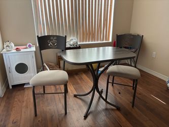 Beautiful small bistro table and chairs