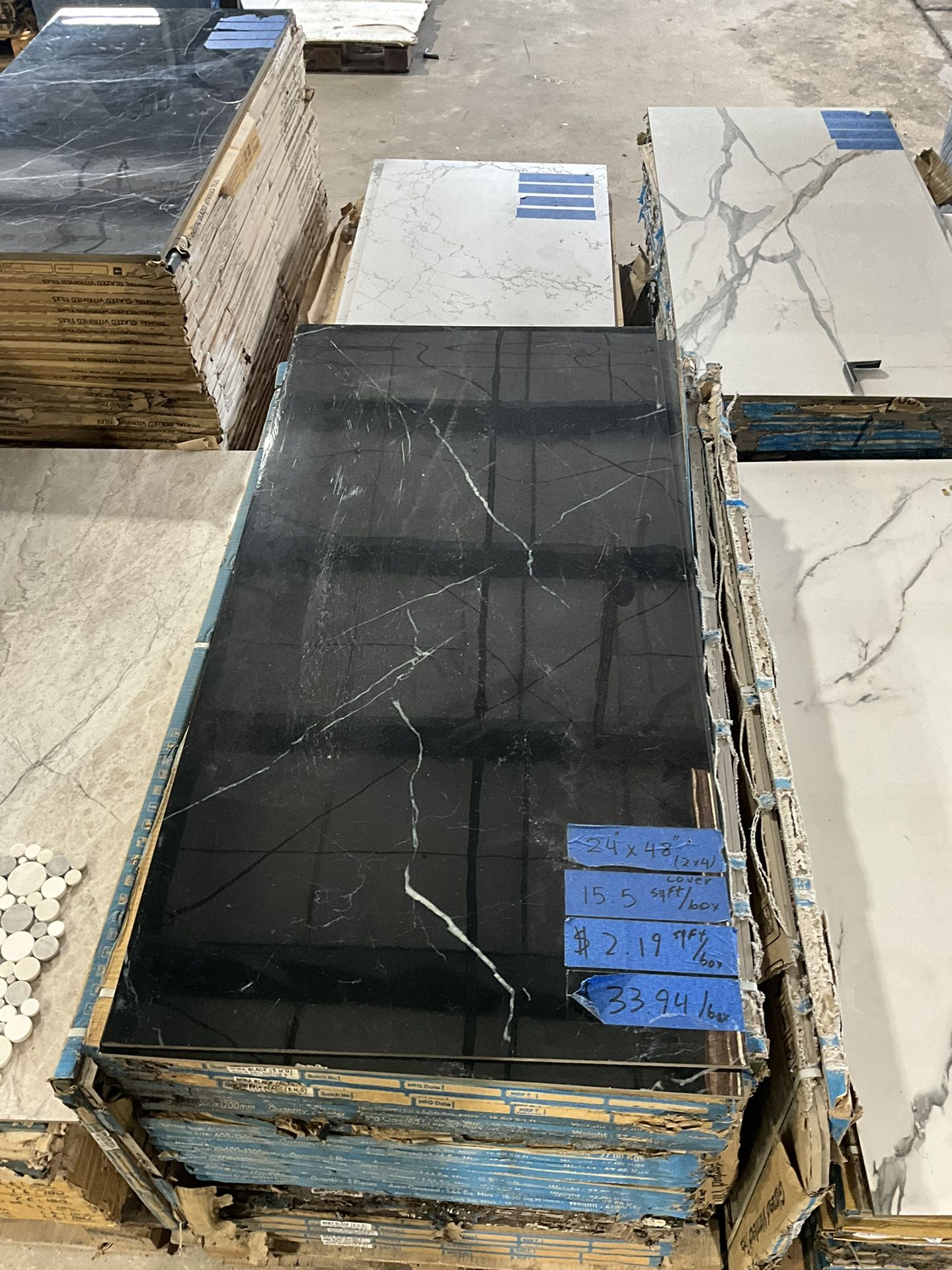 24 in. x 48 in. x 9 mm Polished Porcelain Floor and Wall Tile (15.5 sq. ft./Box) $2.19 /Sq.ft Luke’s liquidations warehouse Address: 2434 N Forsyth