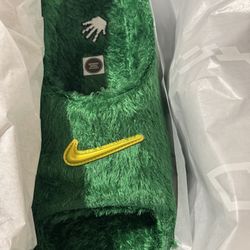 Nike Rejuven8 grass SIZE 10 